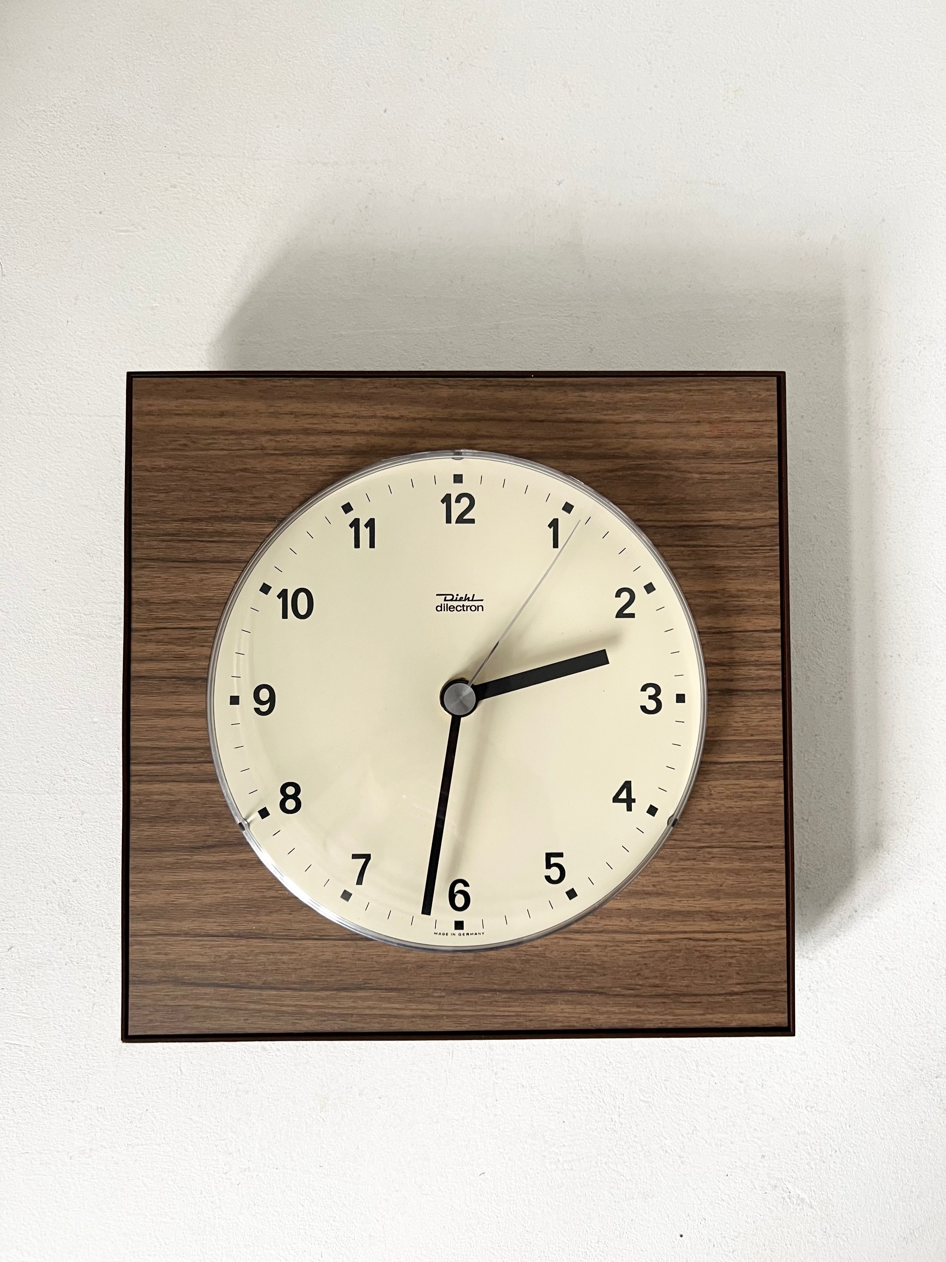 Mid Century Diehl Formica & Plastic wall clock – reflective-forms